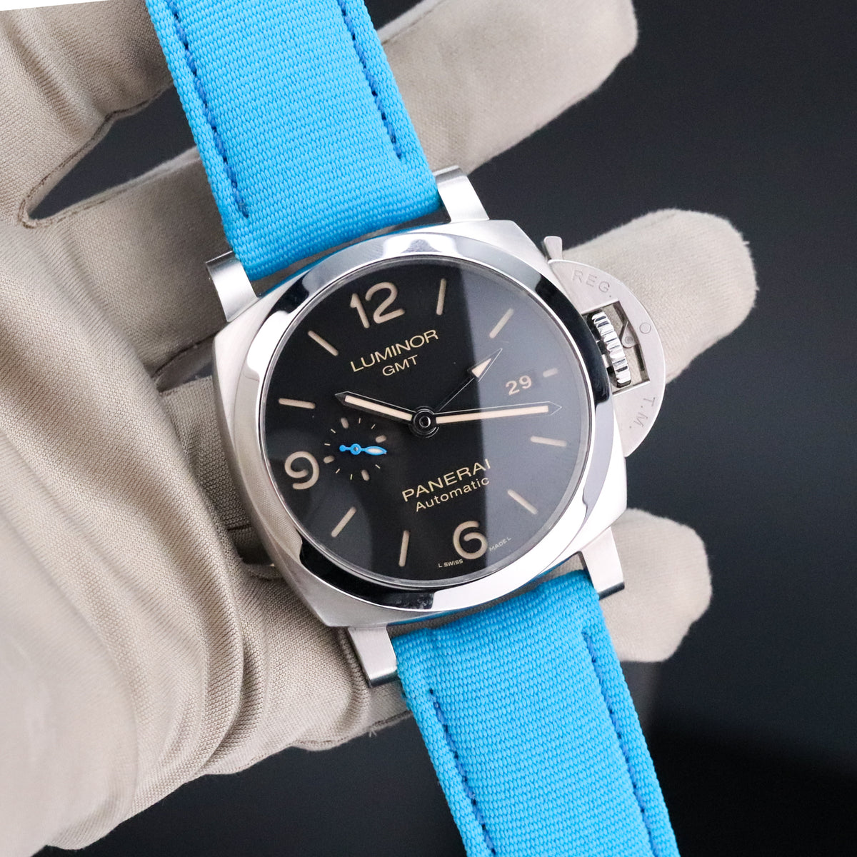 Panerai Luminor 1950 3 Days GMT Complete 44mm Steel Case Black Dial Smooth Bezel Blue Strap PAM01320