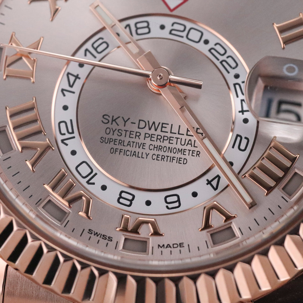 Rolex Sky-Dweller 42mm Sundust Rose Gold Roman Dial Fluted Gold Bezel 326935