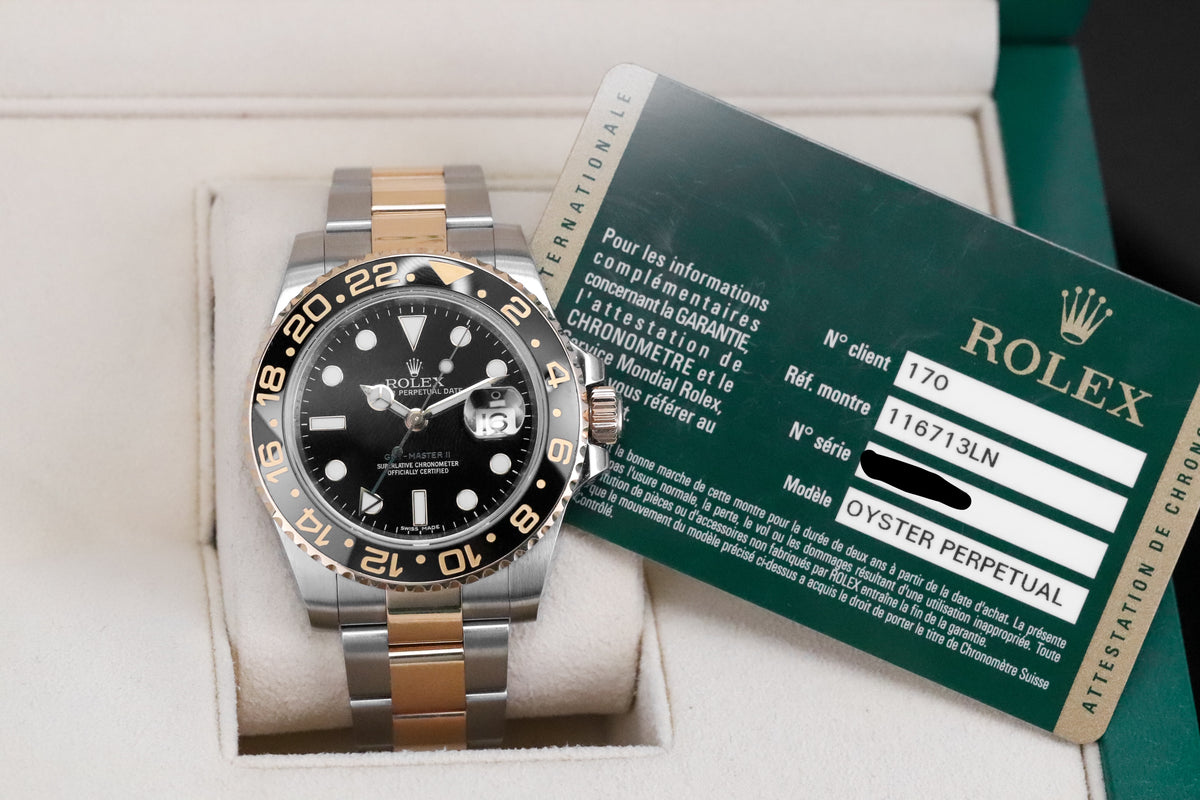 Rolex GMT-Master II 40mm Two Tone Yellow Gold Black Dial Green Arrow Oyster 116713LN - Discontinued Complete Set