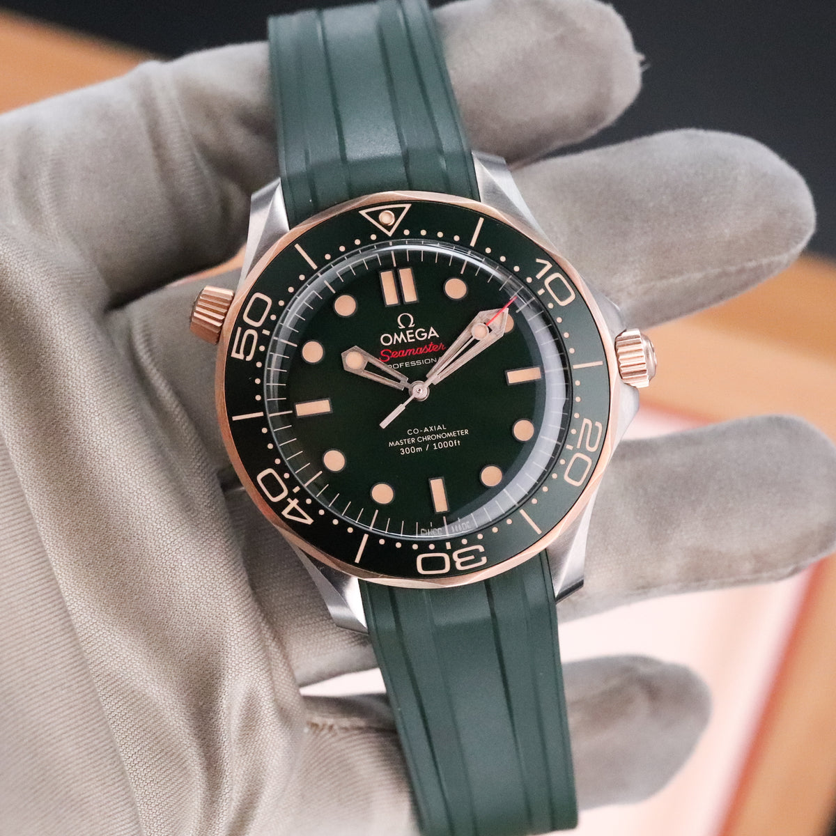 Omega Seamaster Diver 300 M Gold On Rubber 42mm 2025 "Green Bond" Dial Titanium Bronze 210.92.42.20.10.001