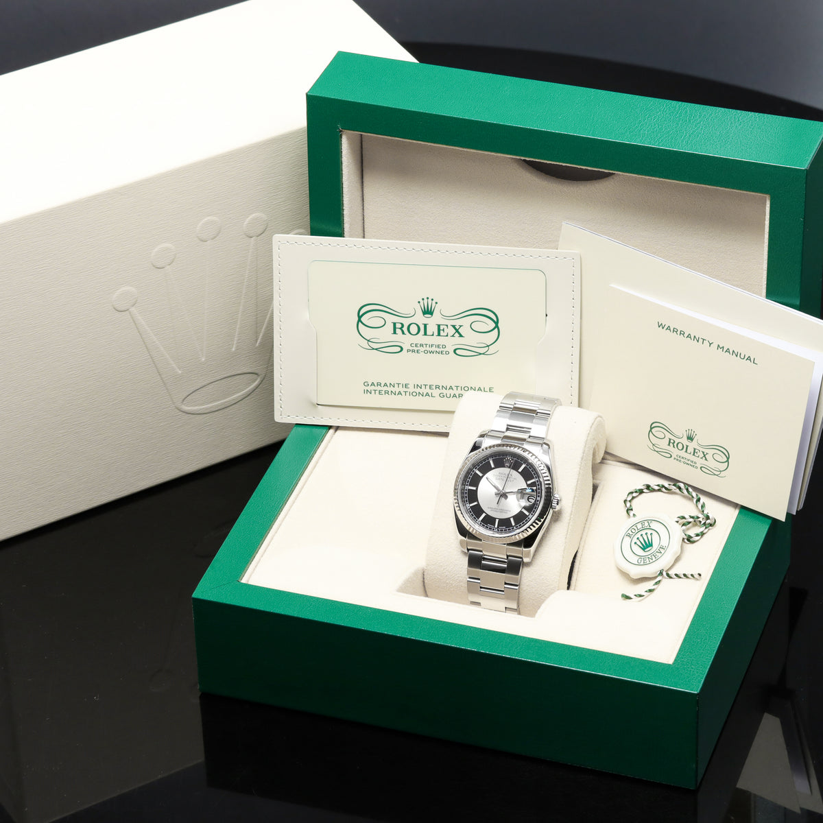 Rolex Datejust 2007 Complete 36mm Stainless Steel and 18k White Gold Tuxedo Dial / Black and Silver Dial 18k White Gold Fluted Bezel Stainless Steel Bracelet with Rolex Clasp 116234