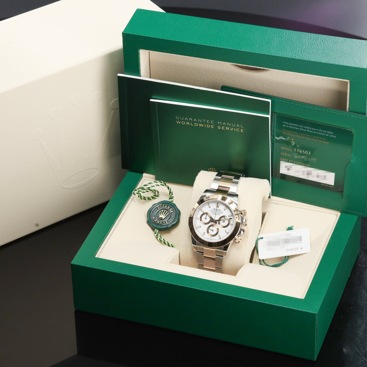 Rolex Daytona 2022 Complete 40mm Oystersteel and Yellow Gold White Dial 18k Yellow Gold Tachymeter Bezel Oystersteel and Yellow Gold Oyster Bracelet with Oysterlock Clasp 116503
