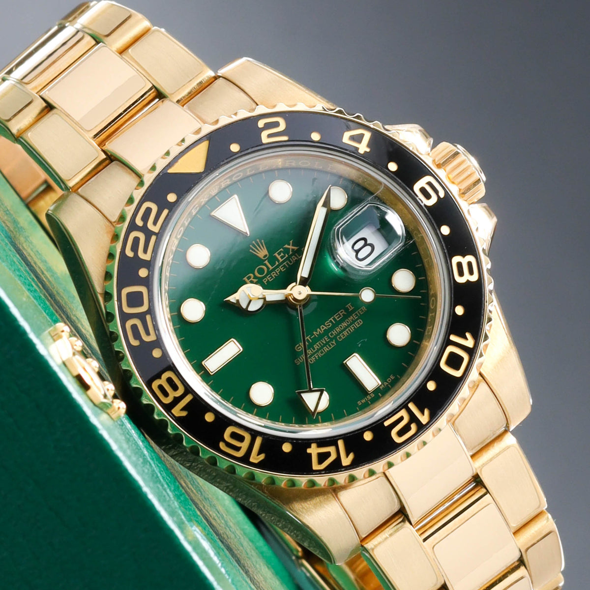 Rolex GMT Master II 2008 Complete 40mm 18k Yellow Gold Green Dial Black Cerachrom Ceramic Bezel 18k Yellow Gold Oyster Bracelet 116718LN