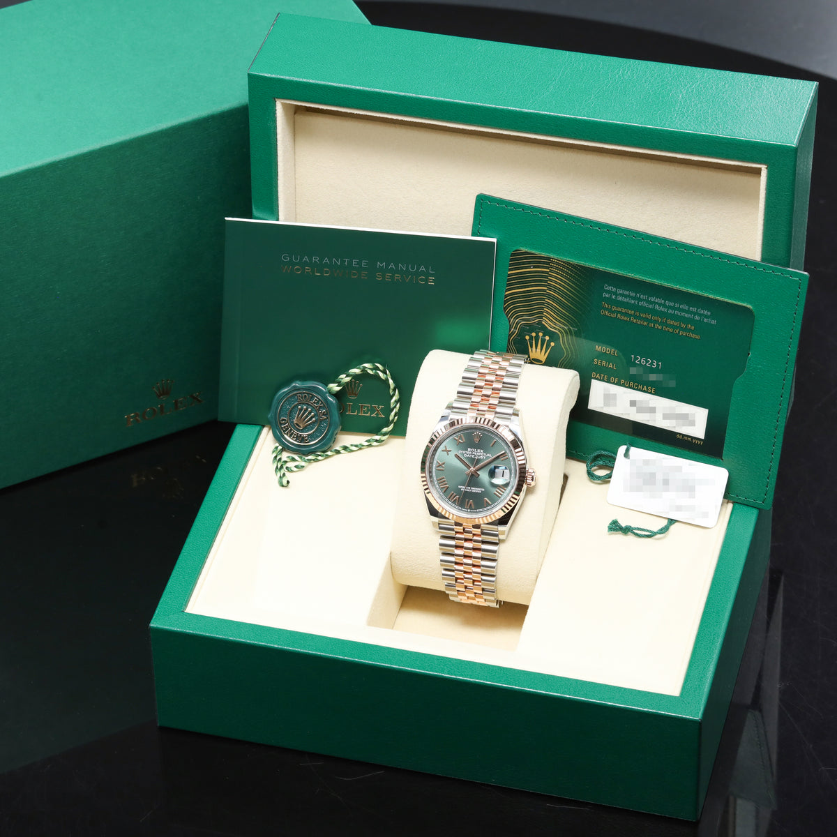 Rolex Datejust 2026 Complete 36mm Oystersteel and 18k Everose Gold Green with Roman Numerals Dial 18k Everose Gold Fluted Bezel  Oystersteel and Everose Gold Jubilee Bracelet 126231