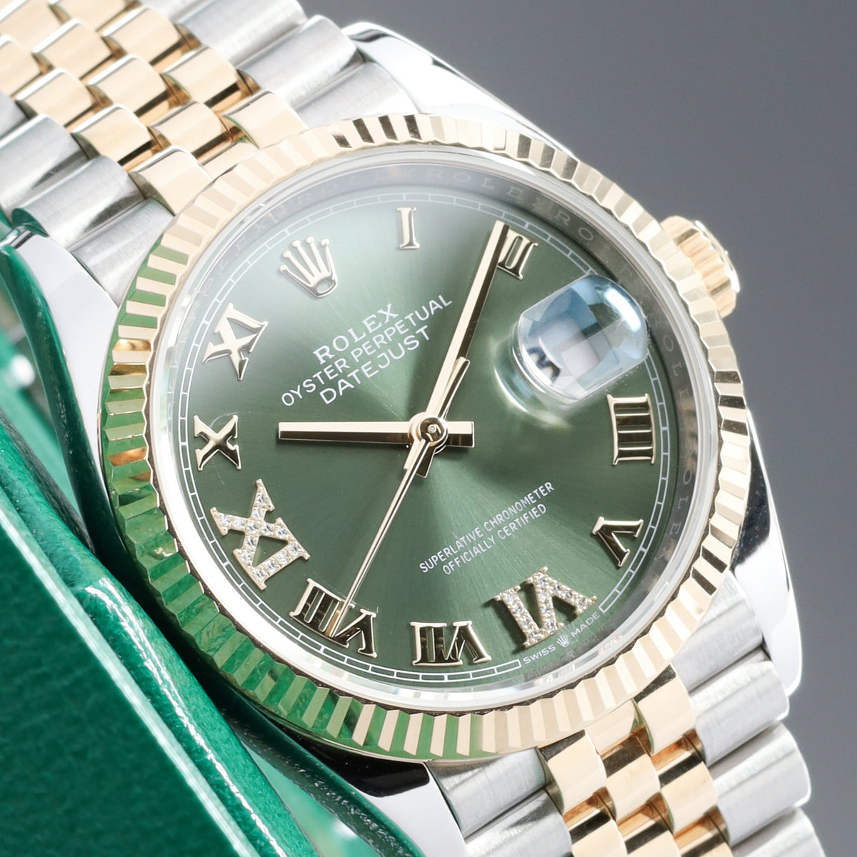 Rolex Datejust 2022 Complete 36mm Oystersteel and 18k Yellow Gold Olive Green with Diamond-Set Roman Numerals Dial 18k Yellow Gold Fluted Bezel Oystersteel and 18k Yellow Gold Jubilee Bracelet with Oysterclasp and Easylink Extension 126233