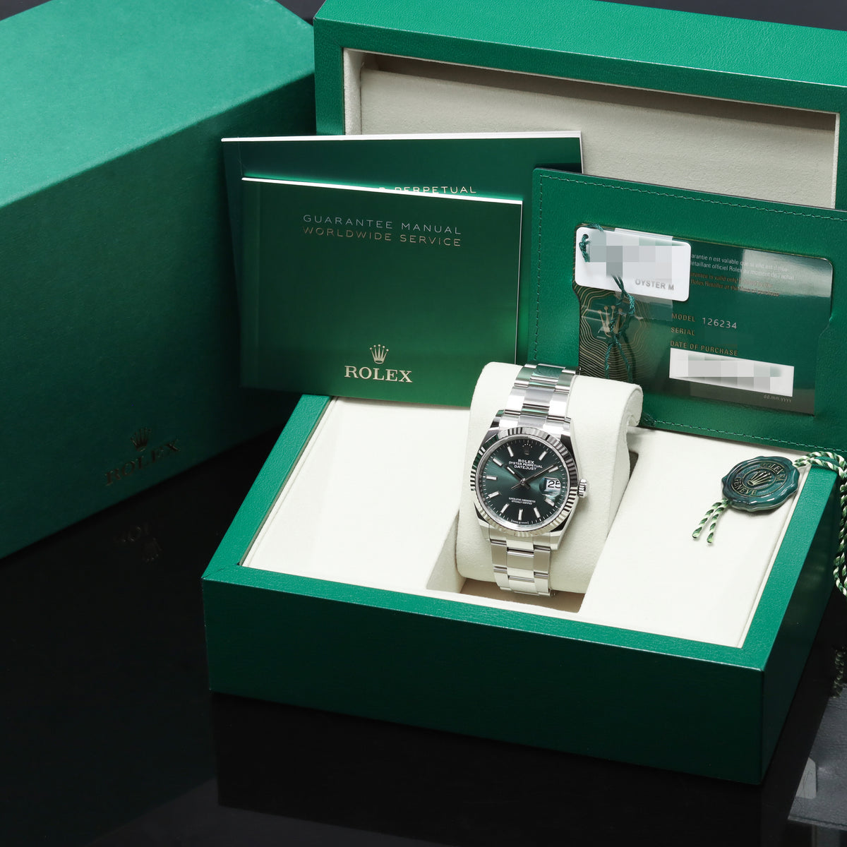 Rolex Datejust 2026 Complete 36mm Oystersteel and 18k White Gold Green Dial 18k White Gold Fluted Bezel Oystersteel Oyster Bracelet with Oysterclasp and Easylink Extension 126234