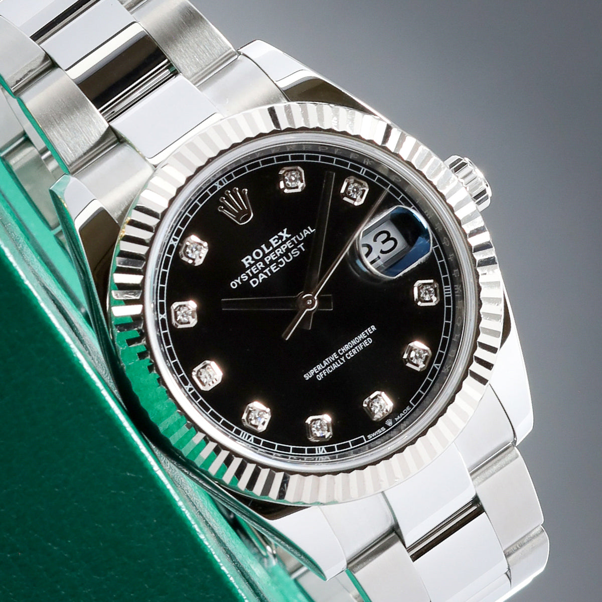 Rolex Datejust 41mm Oystersteel Black Diamond Hour Markers 18k White Gold Fluted Bezel Oyster Bracelet 126334