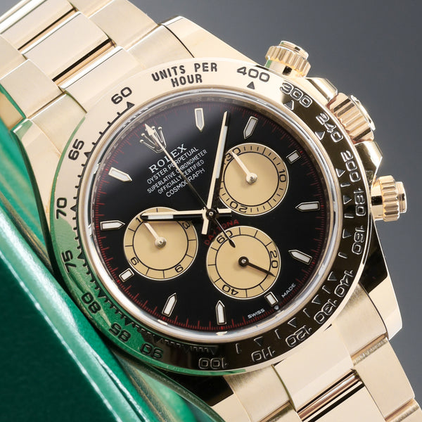 Rolex Daytona 2024 Complete 40mm 18K Yellow Gold Intense Black with Champagne Chronograph Counters Dial  Fixed 18K Yellow Gold Tachymeter Bezel 18K Yellow Gold Oyster Bracelet  126508