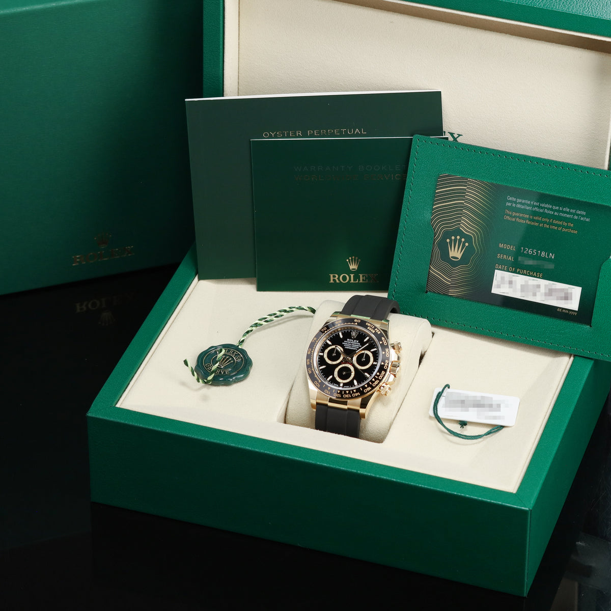 Rolex Daytona 2026 Complete 40mm 18k Yellow Gold Black with Yellow Gold Sub-Dials Black Cerachrom Ceramic Bezel Oysterflex Rubber Bracelet 126518LN