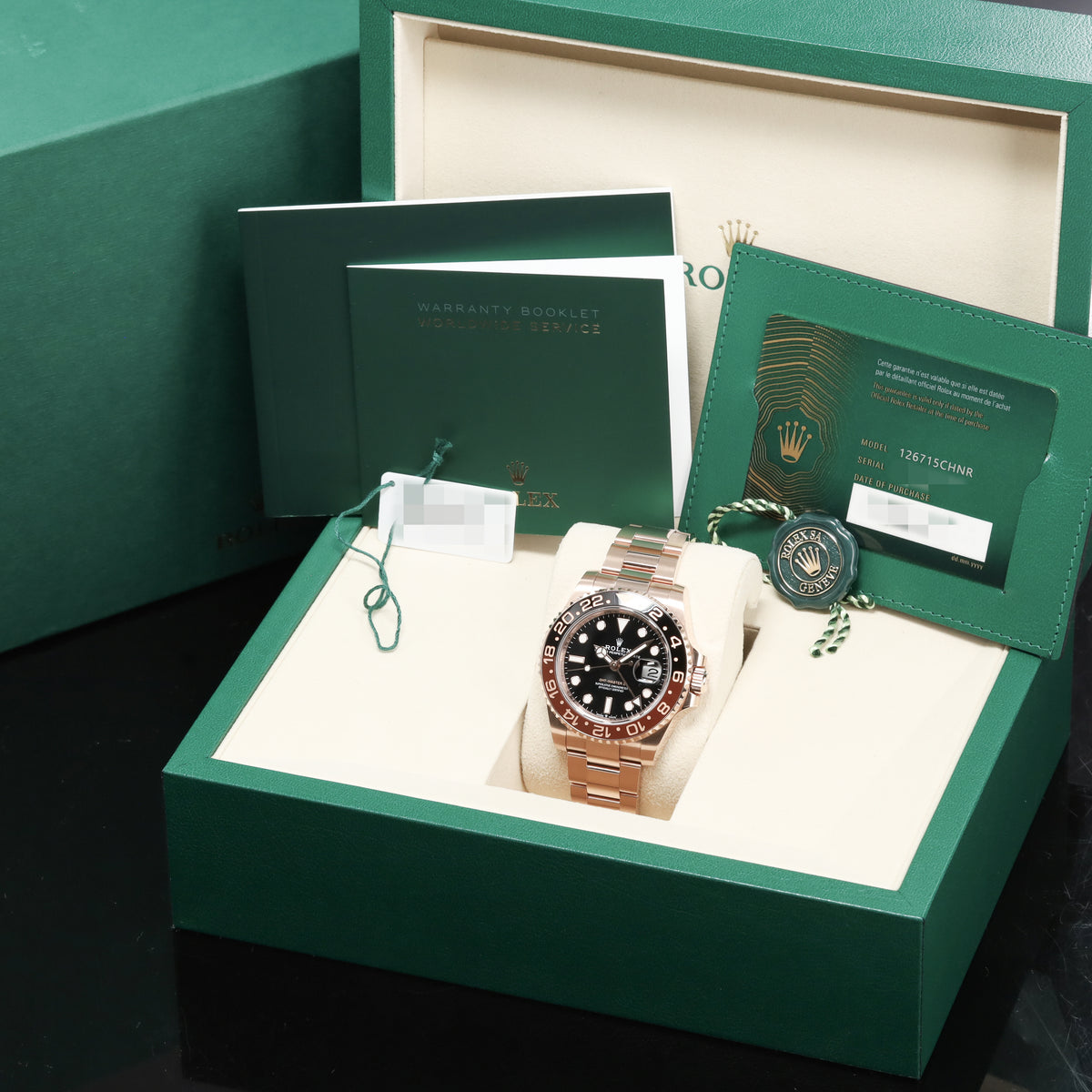 Rolex GMT Master II Complete 40mm 18K Everose Gold Black Dial Brown & Black Cerachrom Ceramic with 18K Everose Gold Bezel 18K Everose Gold Oyster Bracelet 126715CHNR