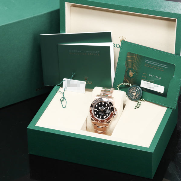 Rolex GMT Master II Complete 40mm 18K Everose Gold Black Dial Brown & Black Cerachrom Ceramic with 18K Everose Gold Bezel 18K Everose Gold Oyster Bracelet 126715CHNR