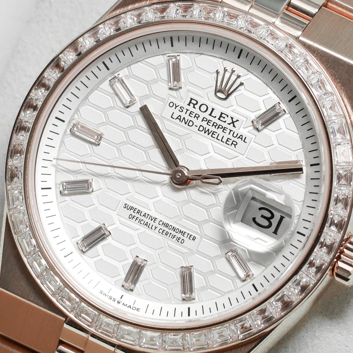Rolex Land Dweller 2026 Complete 36mm 18k Rose Gold White Honeycomb Baguette Diamond Dial Diamond Bezel Jubilee Bracelet 127285TBR