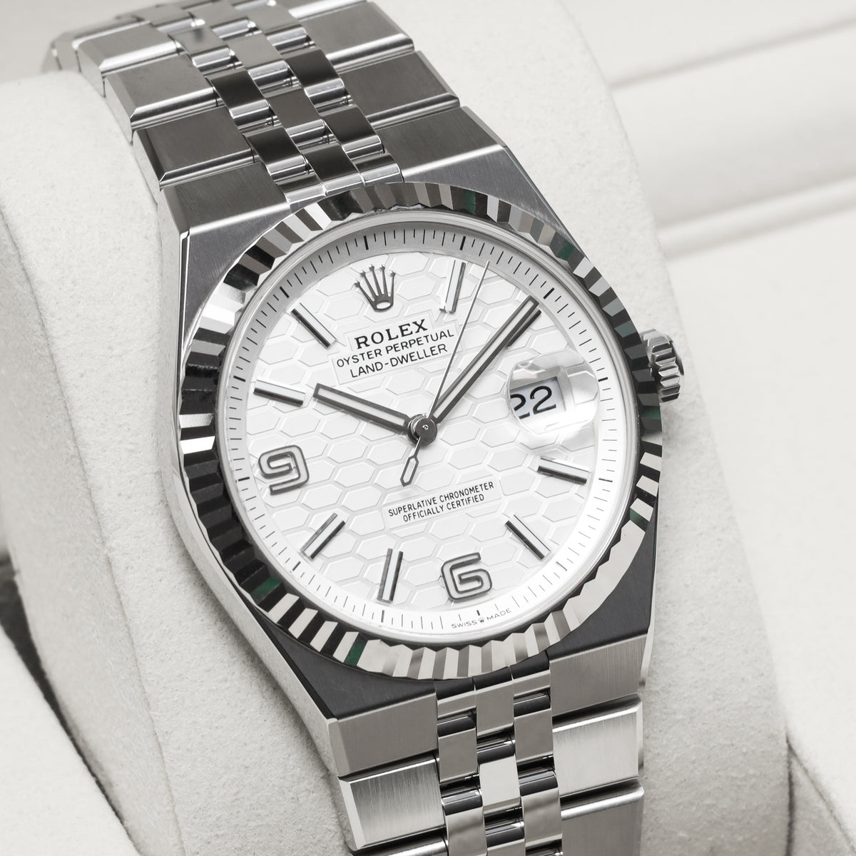 Rolex Land Dweller 2026 Complete 40mm Oystersteel and 18k White Gold Intense White Honeycomb Motif Dial 18k White Gold Fluted Bezel Oystersteel Flat Jubilee Bracelet with Concealed Crownclasp 127334