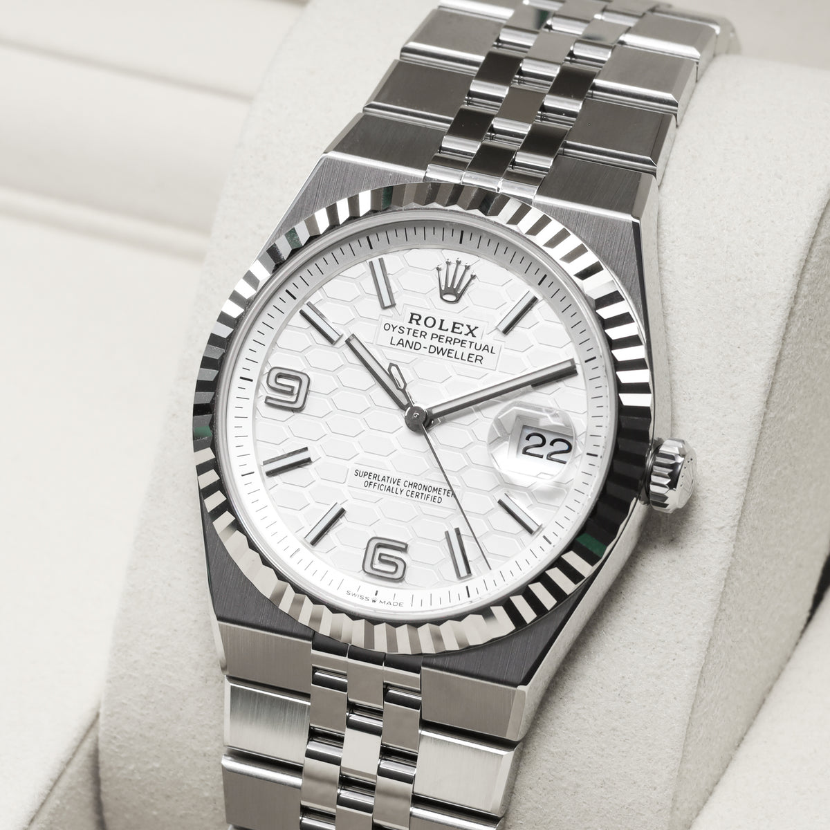Rolex Land Dweller 2026 Complete 40mm Oystersteel and 18k White Gold Intense White Honeycomb Motif Dial 18k White Gold Fluted Bezel Oystersteel Flat Jubilee Bracelet with Concealed Crownclasp 127334