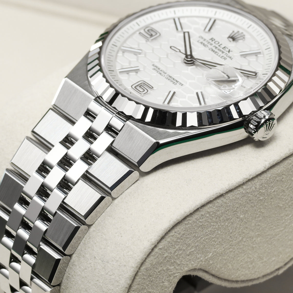Rolex Land Dweller 2026 Complete 40mm Oystersteel and 18k White Gold Intense White Honeycomb Motif Dial 18k White Gold Fluted Bezel Oystersteel Flat Jubilee Bracelet with Concealed Crownclasp 127334