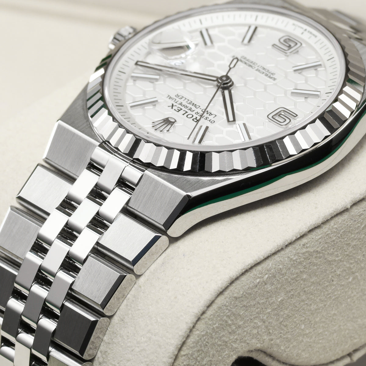 Rolex Land Dweller 2026 Complete 40mm Oystersteel and 18k White Gold Intense White Honeycomb Motif Dial 18k White Gold Fluted Bezel Oystersteel Flat Jubilee Bracelet with Concealed Crownclasp 127334
