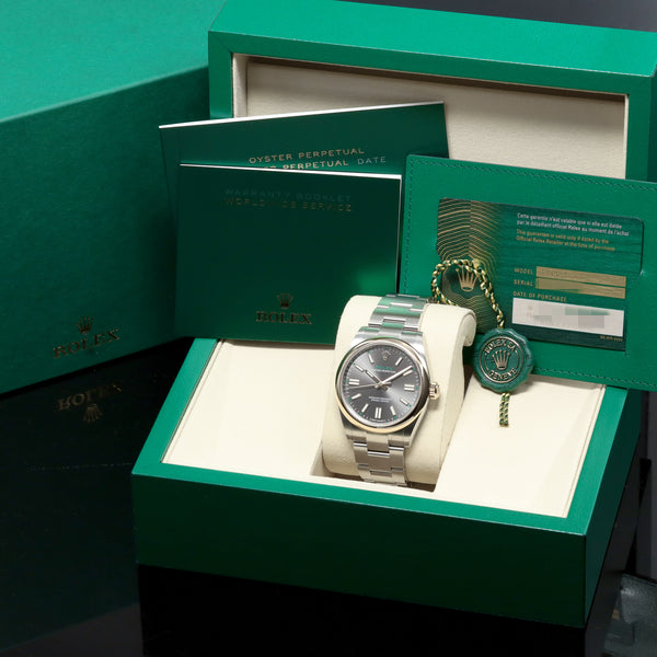 Rolex Oyster Perpetual 41 2026 Complete 41mm Oystersteel Stainless Steel & 18K Yellow Gold Slate Grey with Green Accents and "100 Years" Dial 18K Yellow Gold Smooth Domed Bezel Oystersteel Stainless Steel Oyster Bracelet with Folding Oysterclasp 134303
