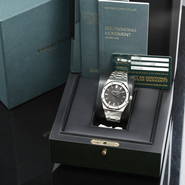 Audemars Piguet Royal Oak Complete 41mm Stainless Steel Black “Grande Tapisserie” Dial Stainless Steel Octagonal Bezel Integrated Stainless Steel Bracelet with AP Folding Clasp 15500ST.OO.1220ST.03