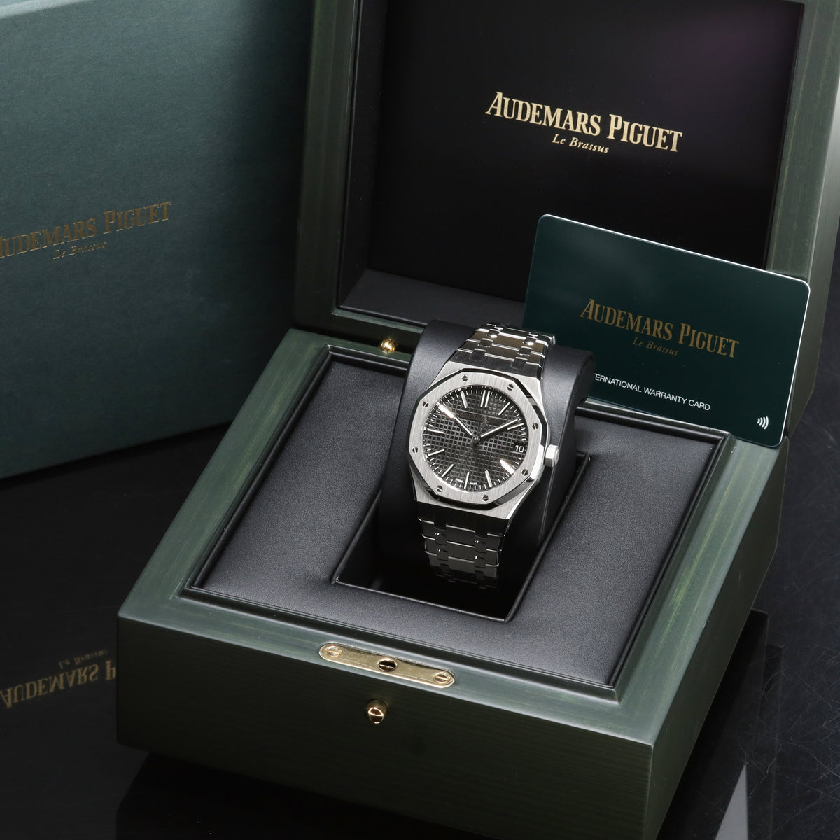 Audemars Piguet Royal Oak Complete 41mm Stainless Steel Black Grande Tapisserie Dial Stainless Steel Octagonal Bezel Stainless Steel Royal Oak Bracelet 15510ST