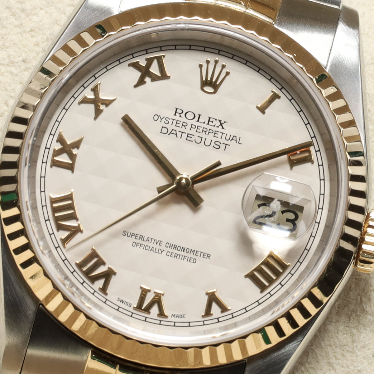 Rolex DateJust 1990 36mm Two-Tone Steel/Gold Silver Pyramid Dial Yellow Gold Fluted Bezel Jubilee 16233