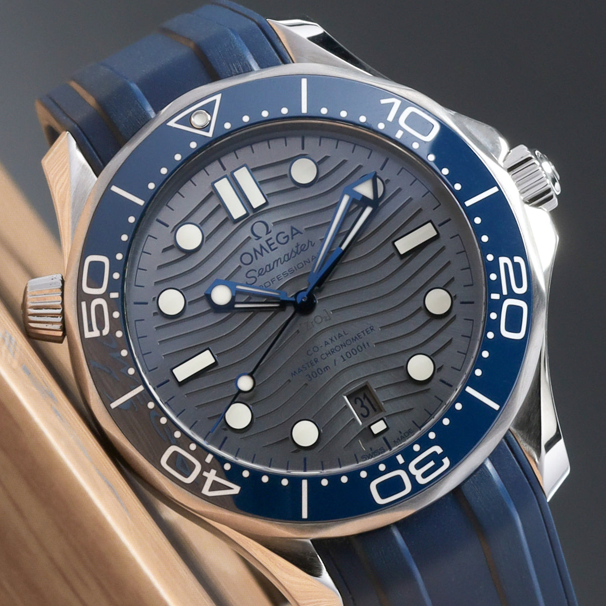 Omega Seamaster 2025 Complete 42mm Stainless Steel Grey Wave Dial Blue Ceramic Unidirectional Bezel Blue Rubber Strap 210.32.42.20.06.001