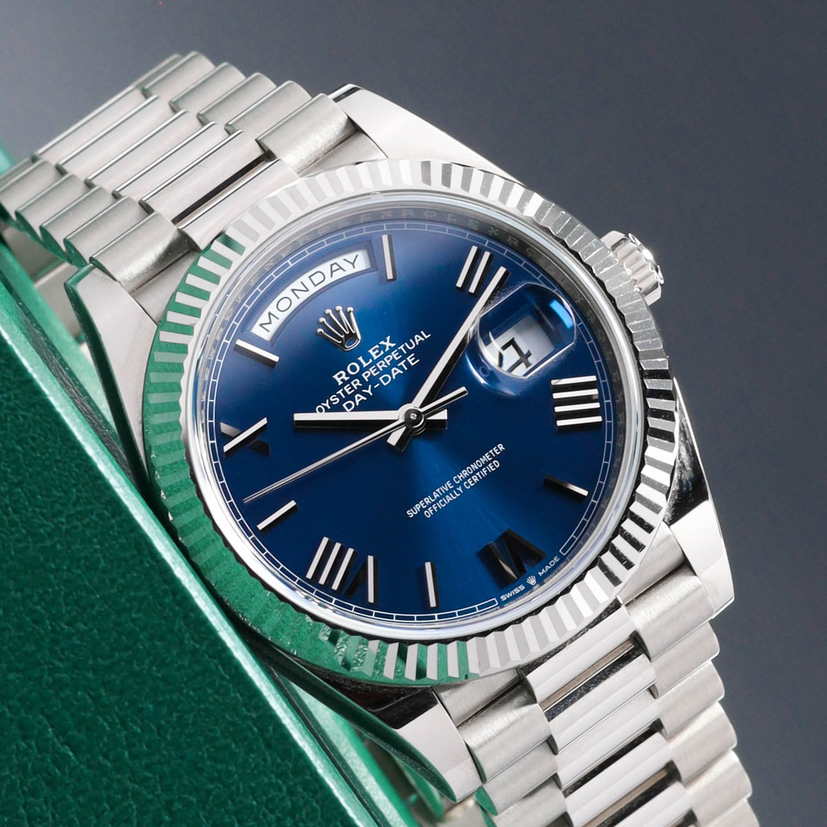 Rolex Day Date 2026 Complete 40mm 18k White Gold Bright Blue Dial 18k White Gold Fluted Bezel President Bracelet 228239