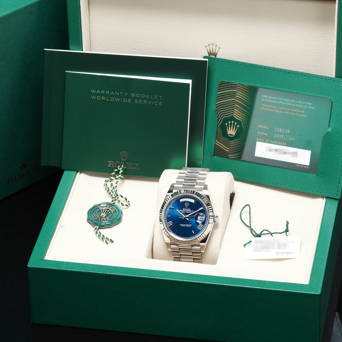 Rolex Day Date 2026 Complete 40mm 18k White Gold Bright Blue Dial 18k White Gold Fluted Bezel President Bracelet 228239