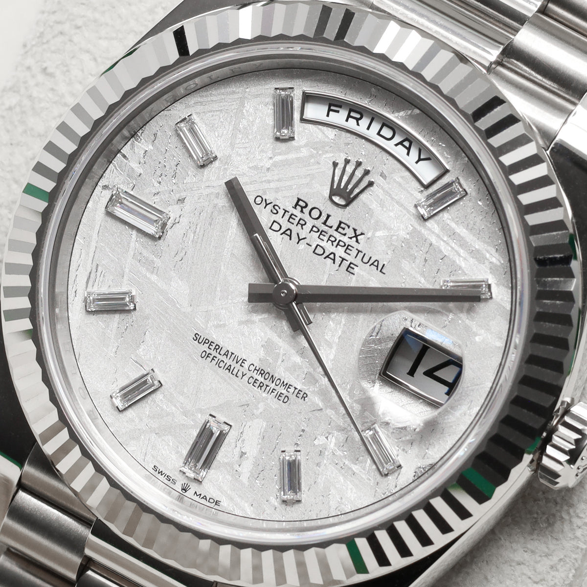 Rolex Day Date 2024 Complete 40mm 18k White Gold Meteorite with Baguette-Cut Diamond Markers Dial 18k White Gold Fluted Bezel 18k White Gold President Bracelet with Concealed Crownclasp 228239