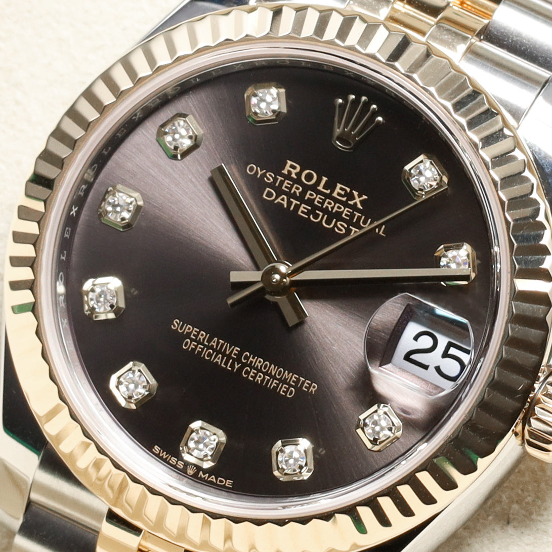 Rolex Datejust 2025 Complete 31mm Oystersteel and Yellow Gold Grey with Diamond Hour Markers Dial Yellow Gold Fluted Bezel Two-Tone Jubilee Bracelet 278273