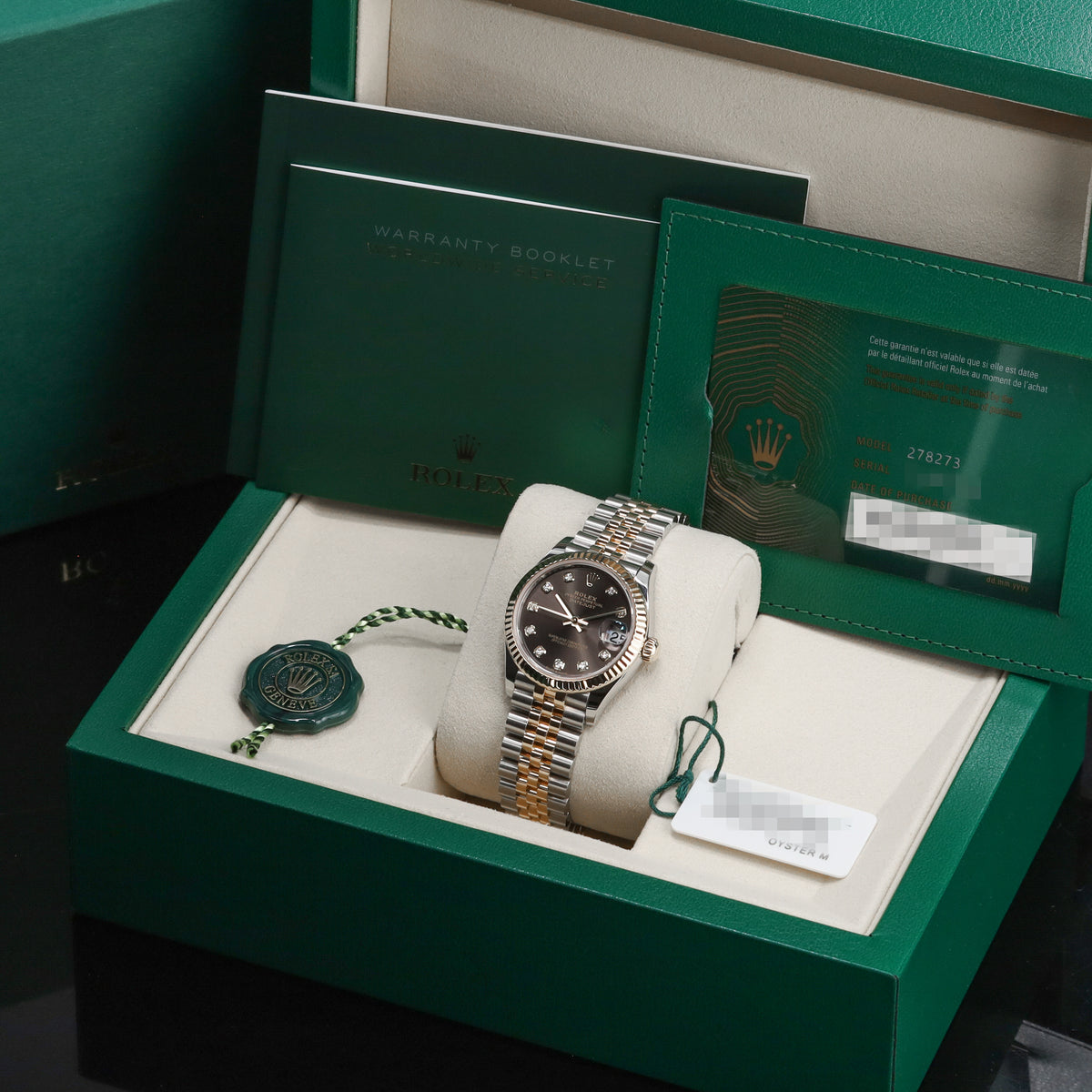 Rolex Datejust 2025 Complete 31mm Oystersteel and Yellow Gold Grey with Diamond Hour Markers Dial Yellow Gold Fluted Bezel Two-Tone Jubilee Bracelet 278273