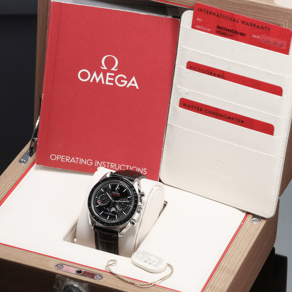 Omega Speedmaster 2022 Complete 44.25mm Stainless Steel Black Dial Black Ceramic Tachymeter Bezel Black Leather Strap with Stainless Steel Folding Clasp 304.33.44.52.01.001