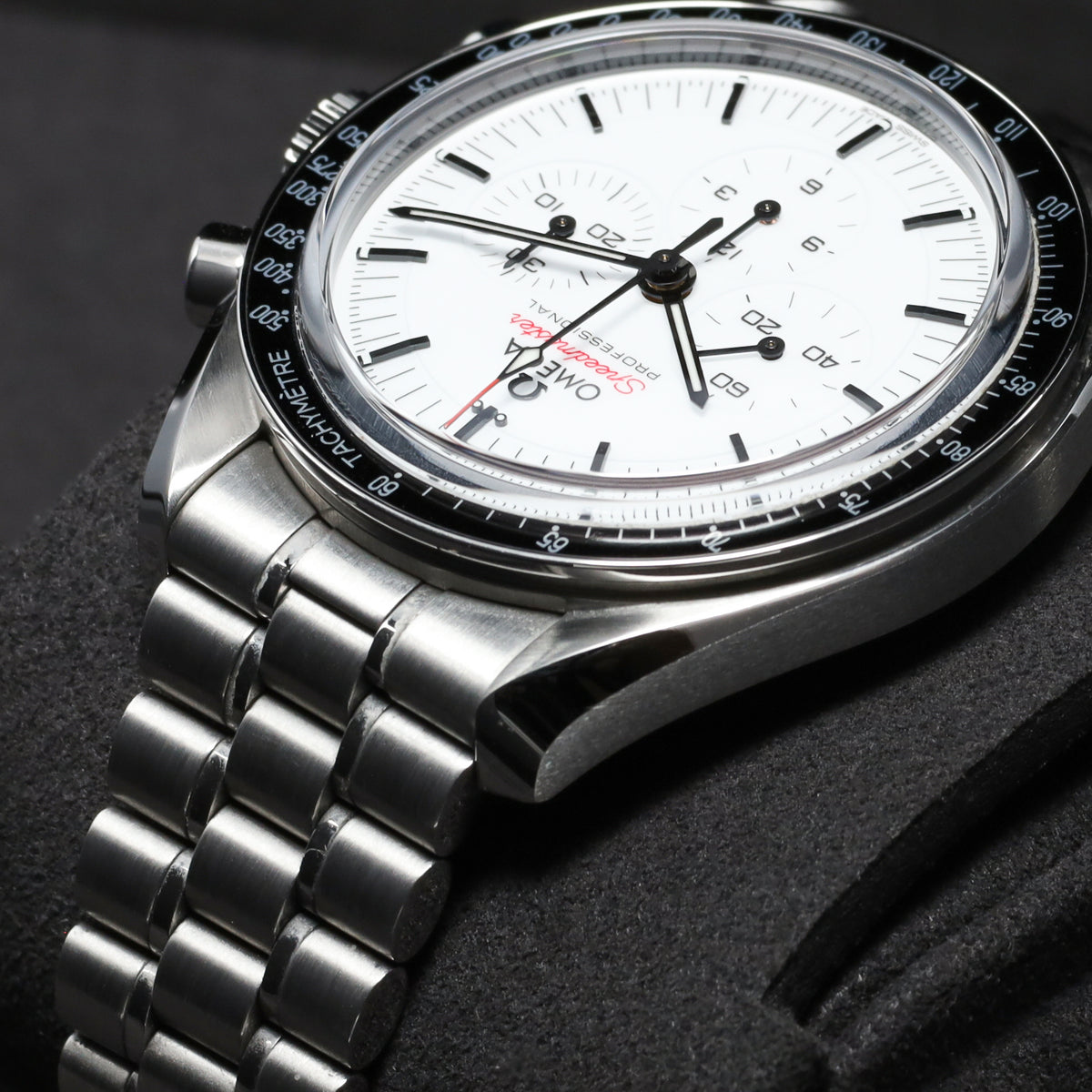 Omega Speedmaster 2026 42mm Stainless Steel  White Lacquered Dial with Black Accents Fixed Black Anodized Aluminum Tachymeter Bezel  Stainless Steel Five-Link Bracelet with Foldover Clasp 310.30.42.50.04.001