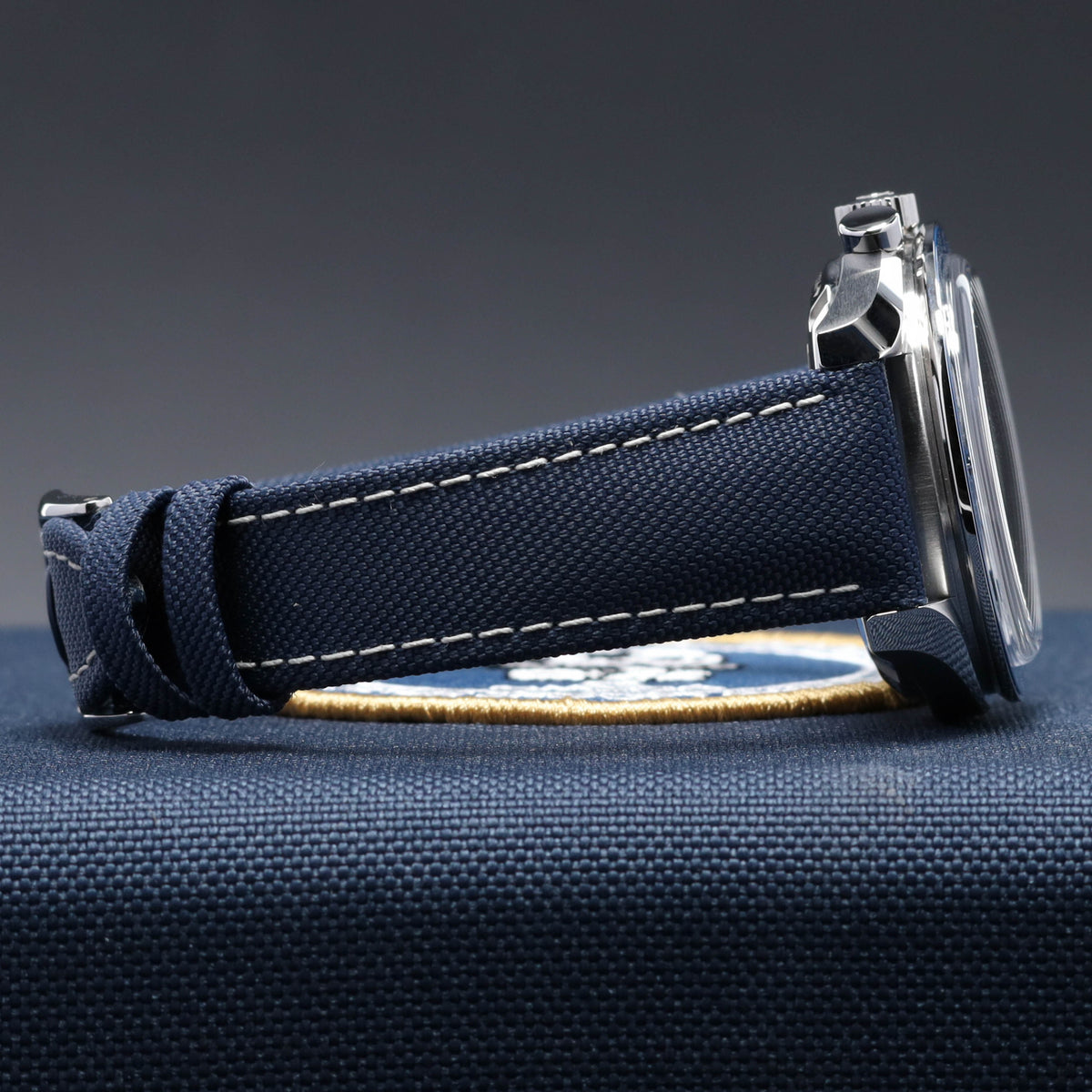 Omega Speedmaster 2026 Complete 42mm Stainless Steel Silver with Snoopy Subdial Blue Ceramic Bezel Blue Nylon Fabric Strap 310.32.42.50.02.001