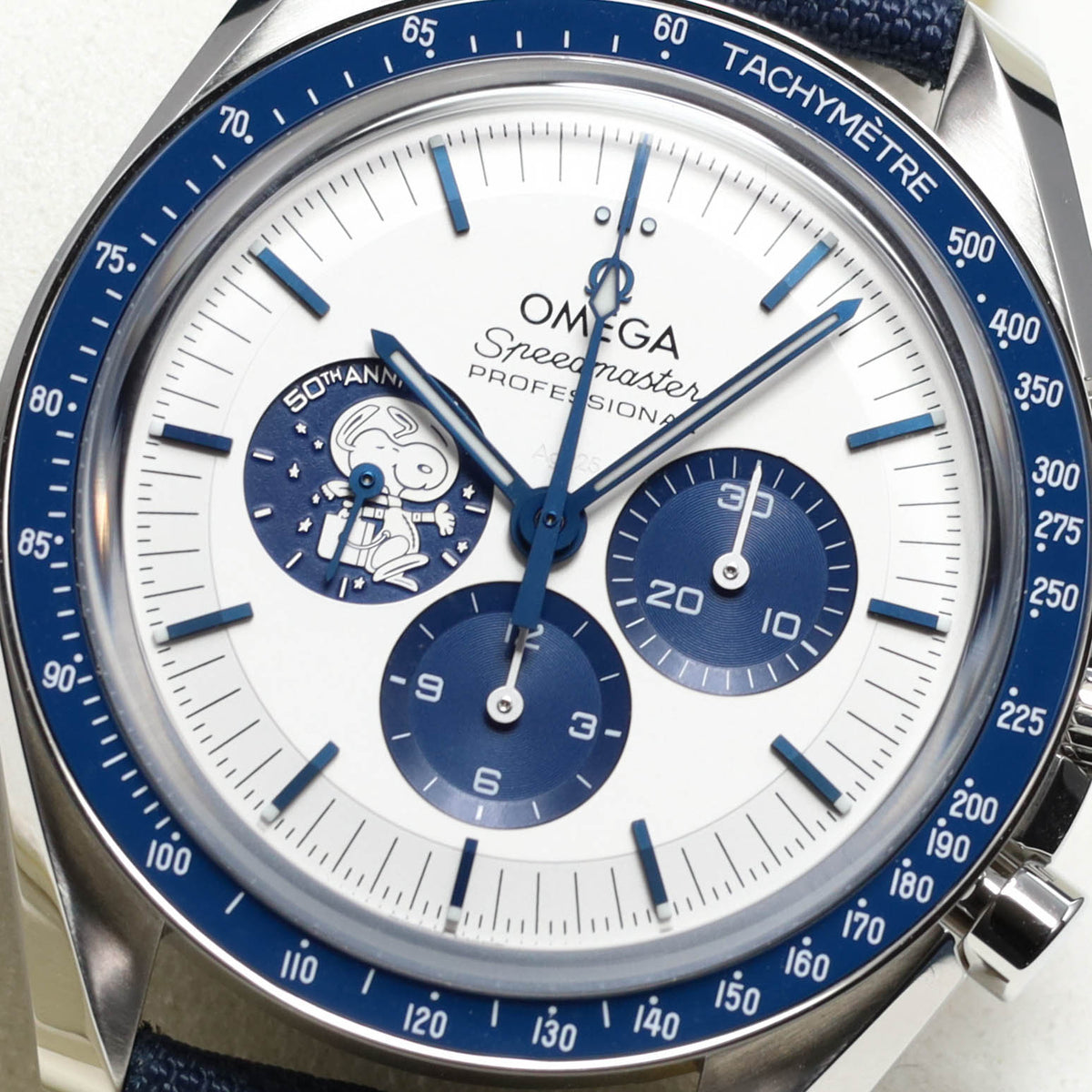 Omega Speedmaster 2026 Complete 42mm Stainless Steel Silver with Snoopy Subdial Blue Ceramic Bezel Blue Nylon Fabric Strap 310.32.42.50.02.001