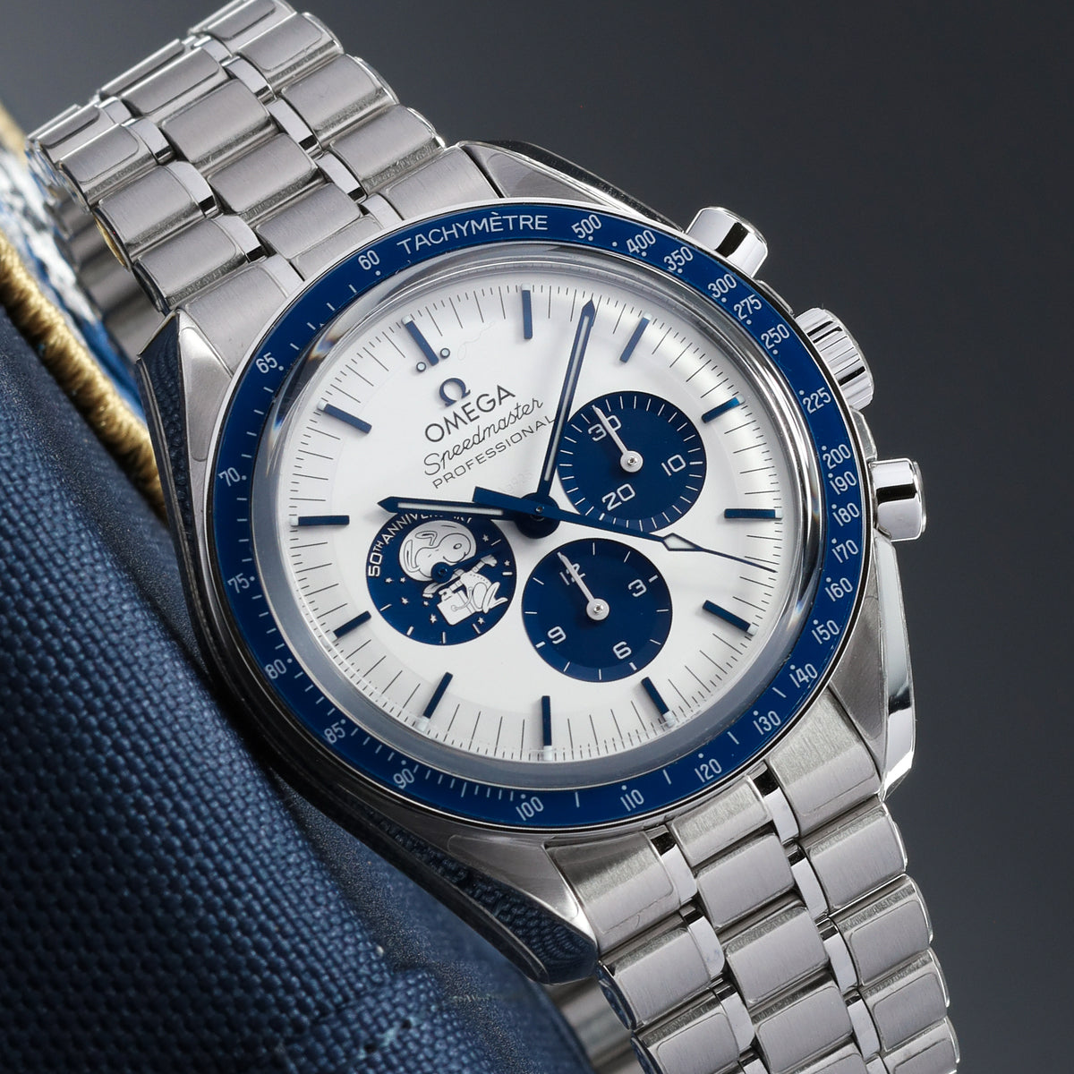 Omega Speedmaster Snoopy 2024 Complete 42mm Steel Case Silver-White With Blue Accents Dial Blue Ceramic Tachymeter Bezel Steel Bracelet 310.32.42.50.02.001