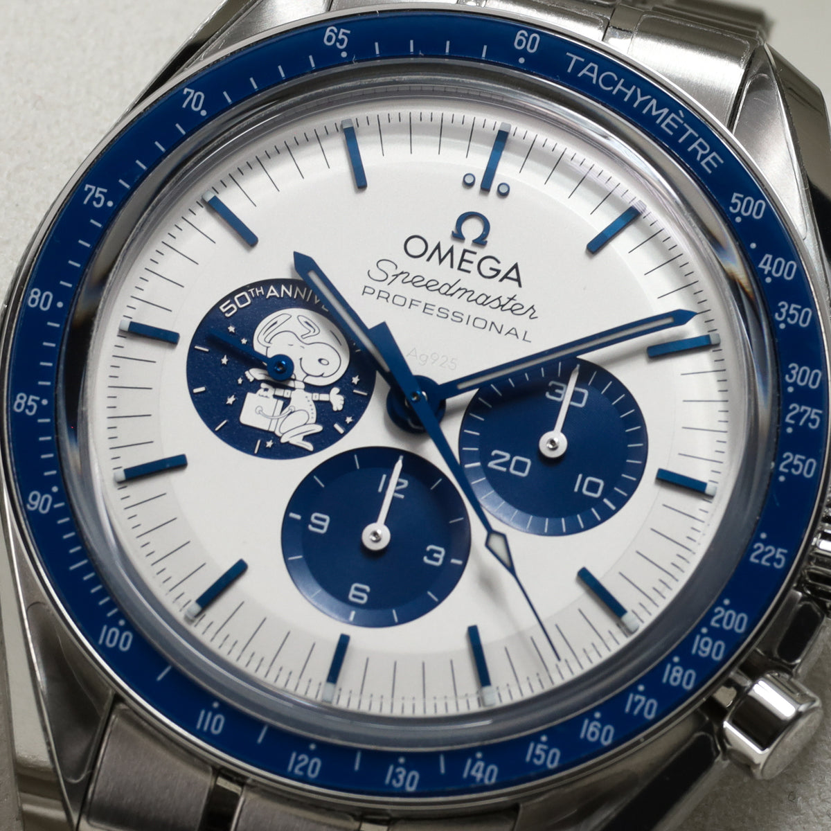 Omega Speedmaster Snoopy 2024 Complete 42mm Steel Case Silver-White With Blue Accents Dial Blue Ceramic Tachymeter Bezel Steel Bracelet 310.32.42.50.02.001
