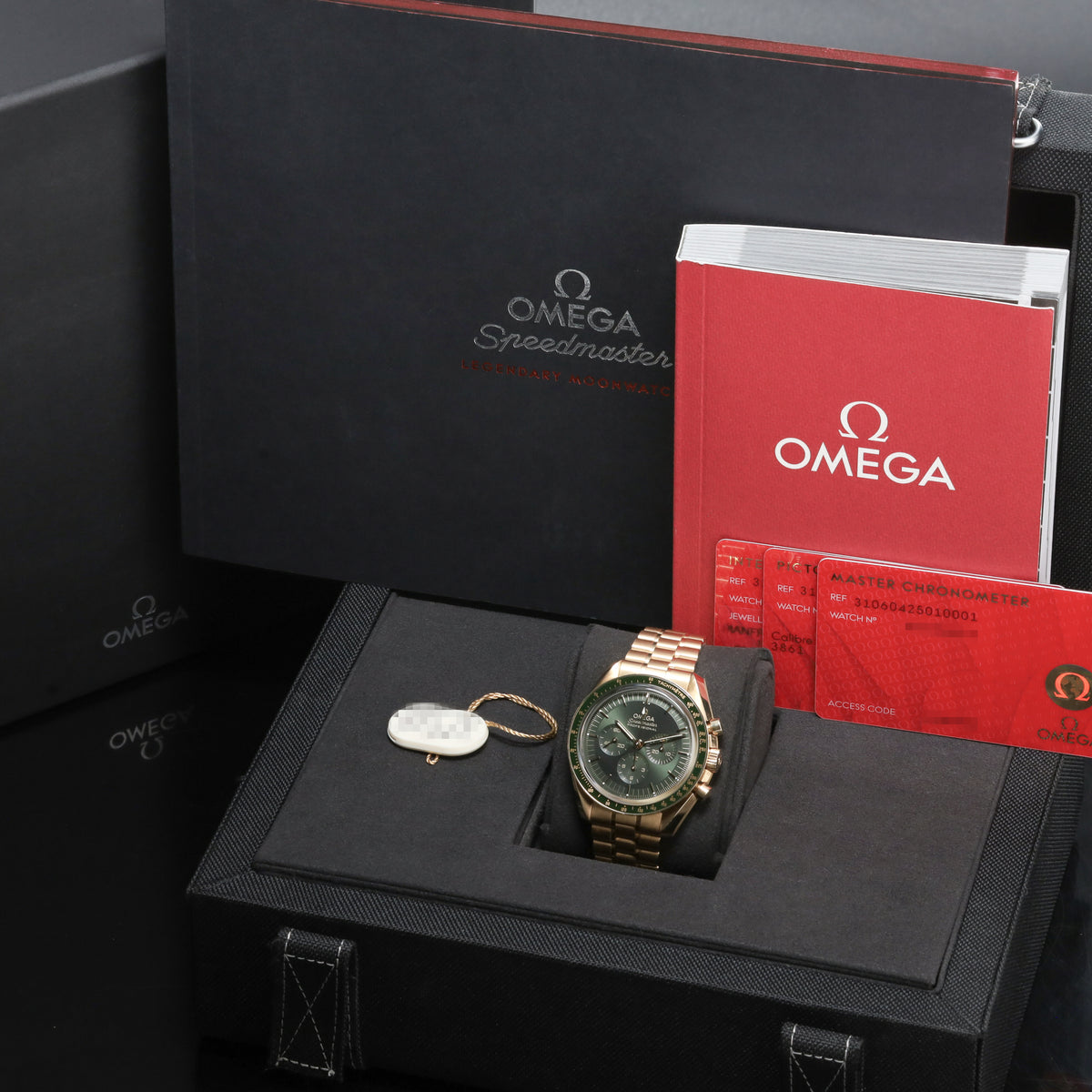 Omega Speedmaster 2022 Complete 42mm 18k Moonshine Gold Green Dial Ceramic Tachymeter Bezel 18k Moonshine Gold Bracelet 310.60.42.50.10.001