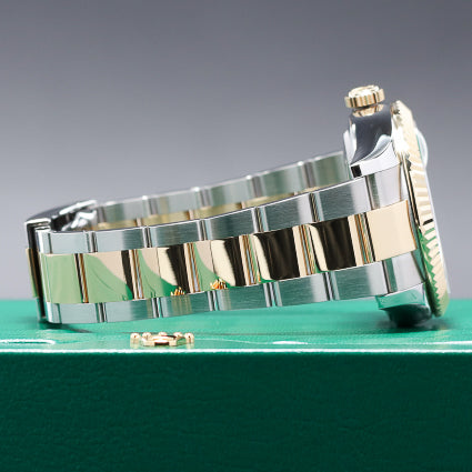 Rolex Sky Dweller Complete 42mm Oystersteel and Yellow Gold White Dial Yellow Gold Fluted Bezel Two-Tone Oyster Bracelet 326933
