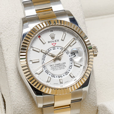 Rolex Sky Dweller Complete 42mm Oystersteel and Yellow Gold White Dial Yellow Gold Fluted Bezel Two-Tone Oyster Bracelet 326933