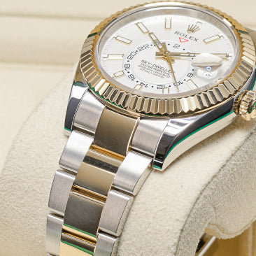 Rolex Sky Dweller Complete 42mm Oystersteel and Yellow Gold White Dial Yellow Gold Fluted Bezel Two-Tone Oyster Bracelet 326933