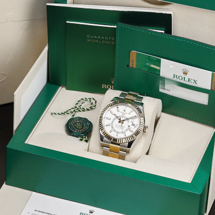 Rolex Sky Dweller Complete 42mm Oystersteel and Yellow Gold White Dial Yellow Gold Fluted Bezel Two-Tone Oyster Bracelet 326933