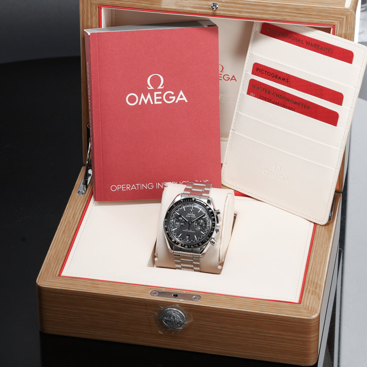 Omega Speedmaster 2022 Complete 44.25mm Stainless Steel Black Racing Dial Black Ceramic Bezel Stainless Steel Bracelet 329.30.44.51.01.001