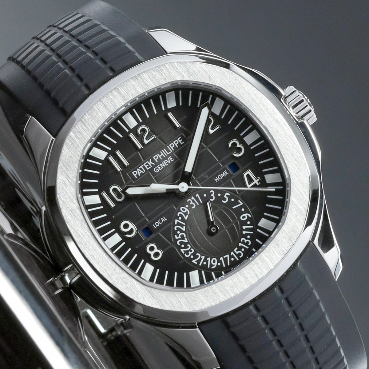 Patek Philippe Aquanaut Travel Time 2017 Complete 40.8mm Stainless Steel Black with Orange GMT Accents Dial Stainless Steel Bezel Black Tropical Rubber Strap 5164A