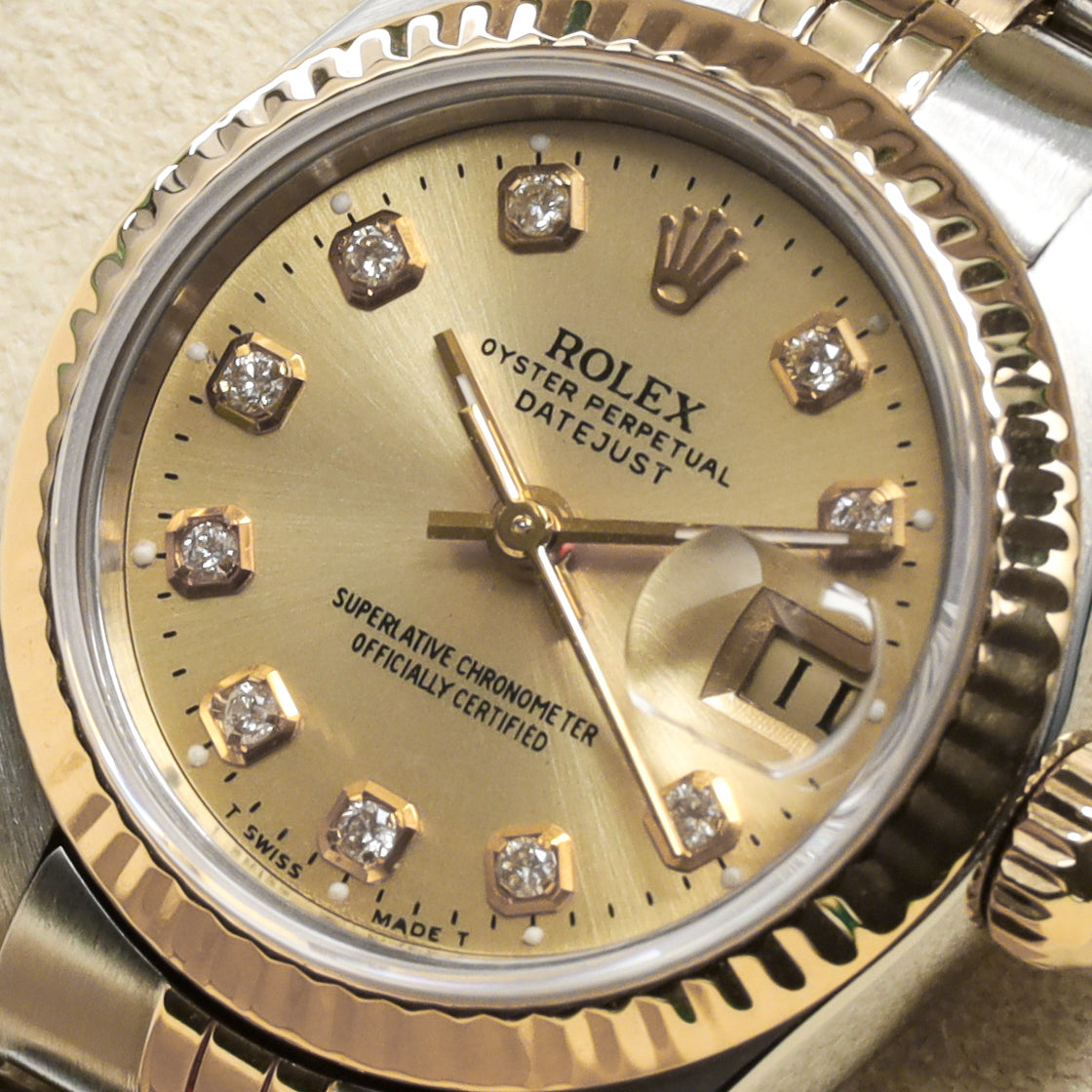 Rolex Datejust Complete 26mm Stainless Steel and Yellow Gold Aftermarket Champagne with Diamond Markers Dial Yellow Gold Fluted Bezel Two-Tone Bracelet Jubilee or Oyster 69173