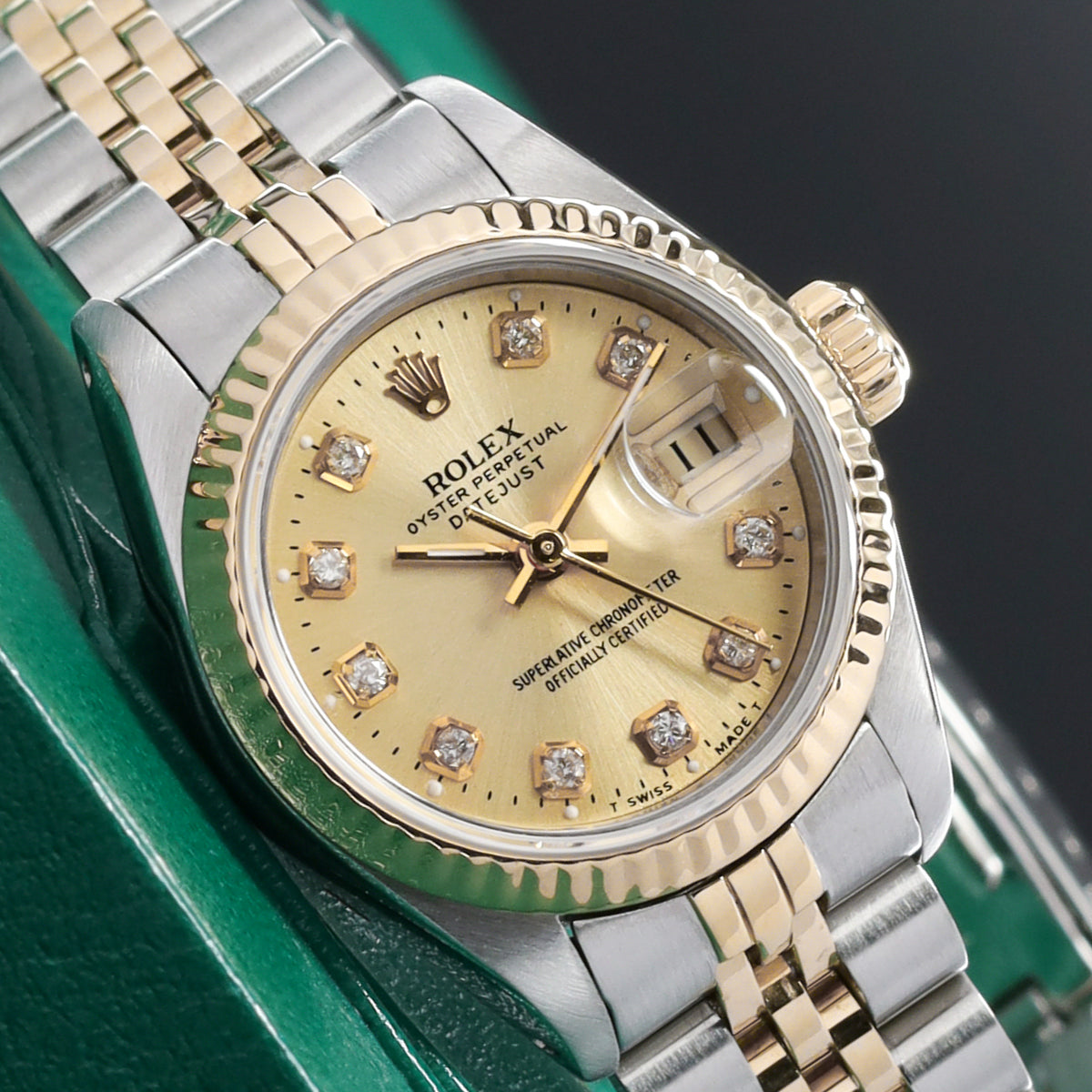 Rolex Datejust Complete 26mm Stainless Steel and Yellow Gold Aftermarket Champagne with Diamond Markers Dial Yellow Gold Fluted Bezel Two-Tone Bracelet Jubilee or Oyster 69173