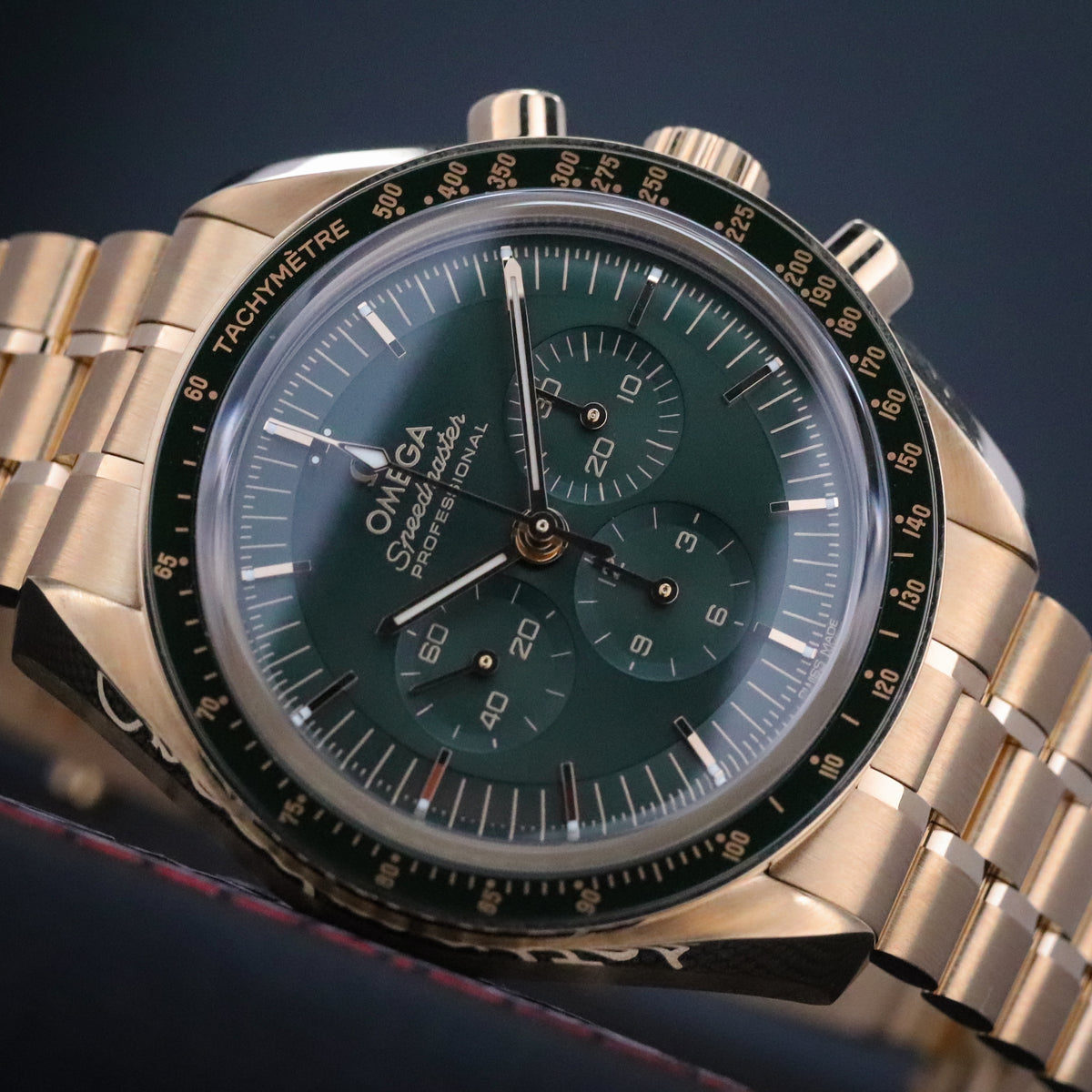 Omega Speedmaster Professional Moonwatch 42mm [2025 COMPLETE] Green 18k Yellow Gold Exhibition Complete Set