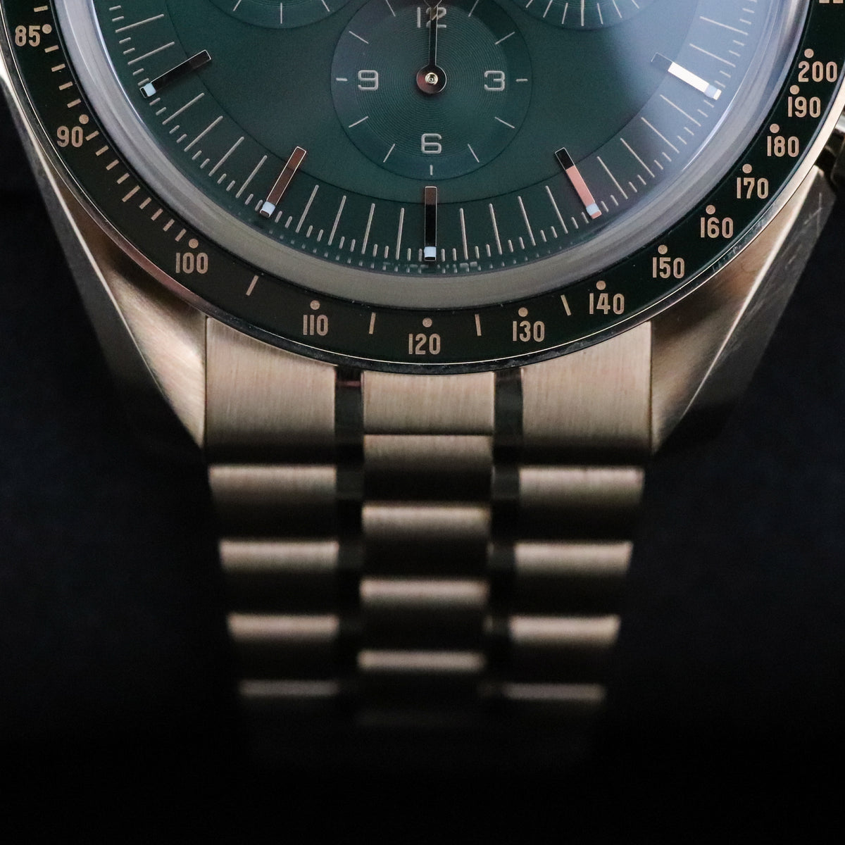 Omega Speedmaster Professional Moonwatch 42mm [2025 COMPLETE] Green 18k Yellow Gold Exhibition Complete Set