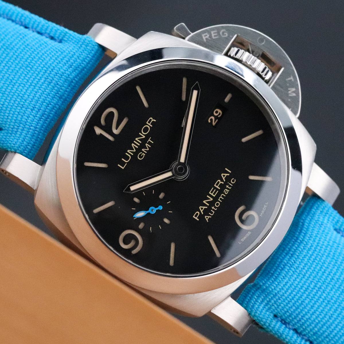 Panerai Luminor 1950 3 Days GMT Complete 44mm Steel Case Black Dial Smooth Bezel Blue Strap PAM01320