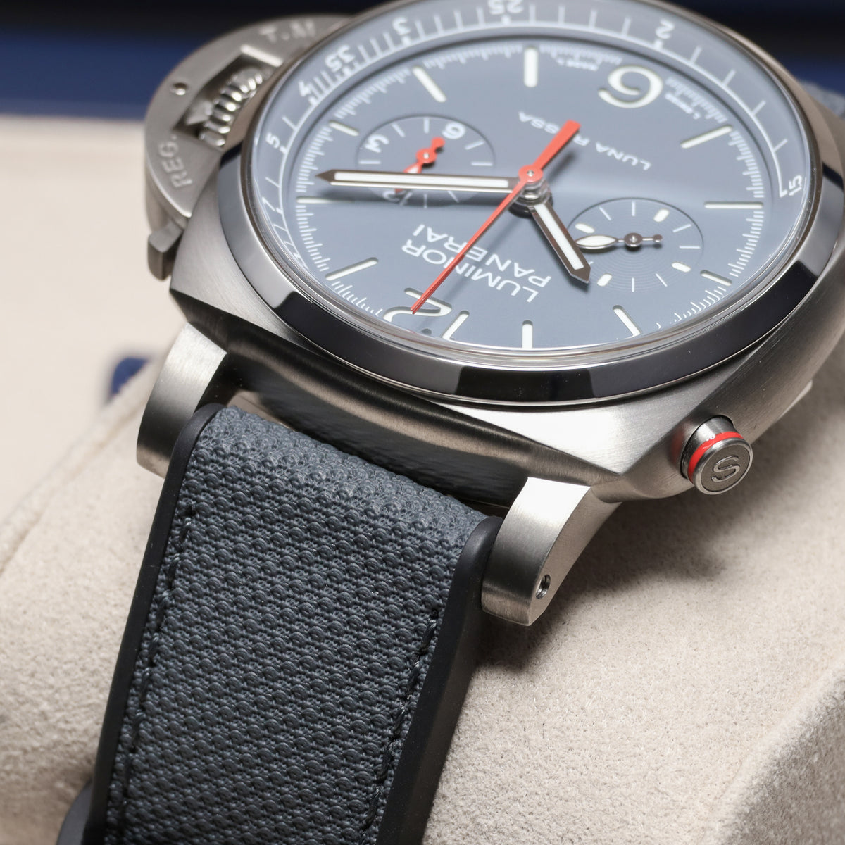 Panerai Luminor 2025 Complete 44mm Titanium Grey with Blue and Red Accents Dial Titanium Bezel Blue Textile Strap PAM01654
