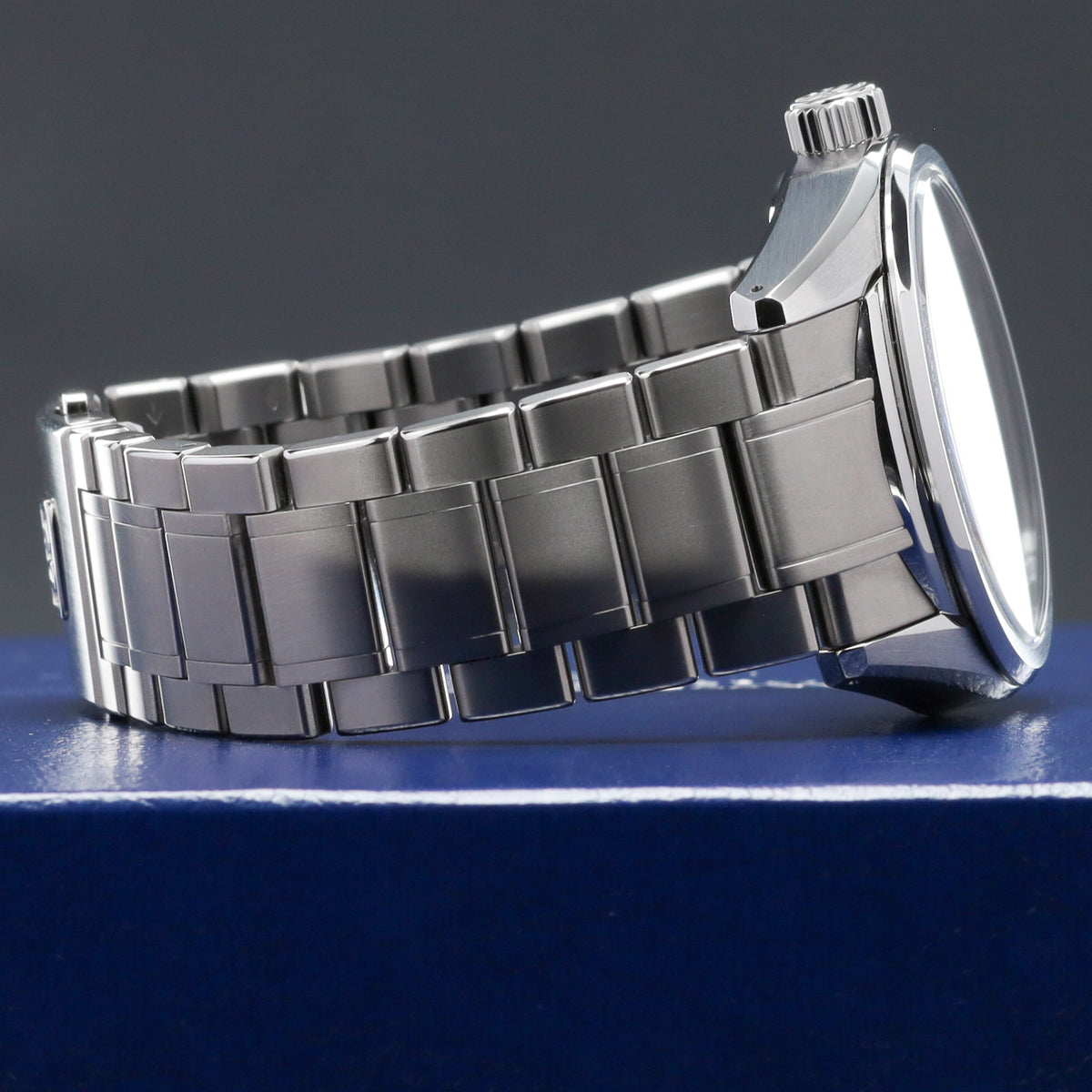 Grand Seiko Evolution 9 Collection 2026 Complete 40mm High Intensity Titanium Blue Lake Suwa Textured Dial High Intensity Titanium Fixed Bezel High-Intensity Titanium Bracelet with Folding Clasp SLGA019G
